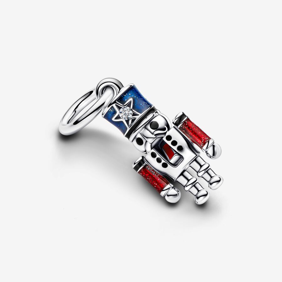 Moveable nutcracker sterling silver dangle with clear cubic zirconia, glittery blue, red and black enamel